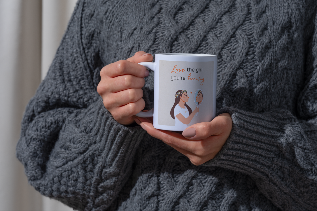 Close-up of a young woman holding a mug with a mental health message, emphasizing mindfulness and intentional daily habits.